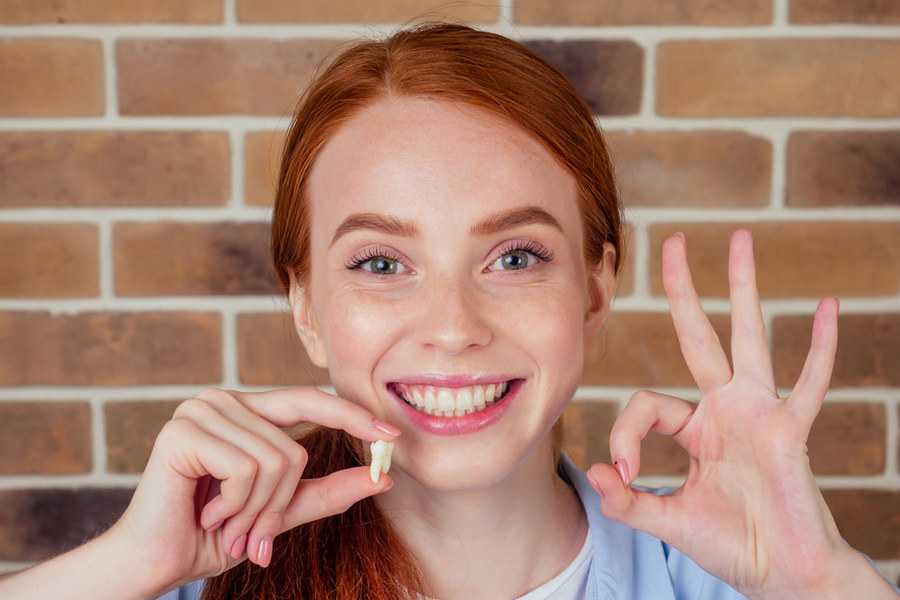 Боль после удаления зуба: сколько дней держится